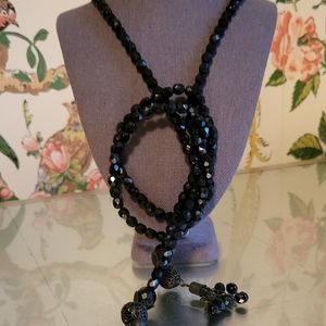 Jet bead rope with tassels.  44 inches long